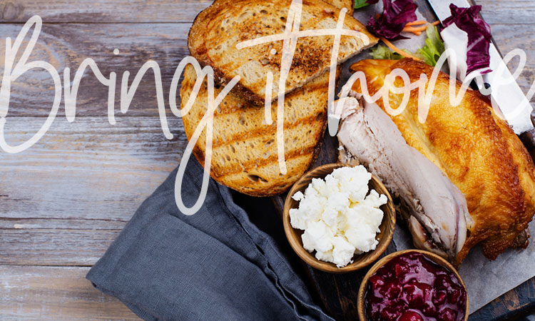 Thanksgiving meal - Turkey, bread and cheese on rustic background